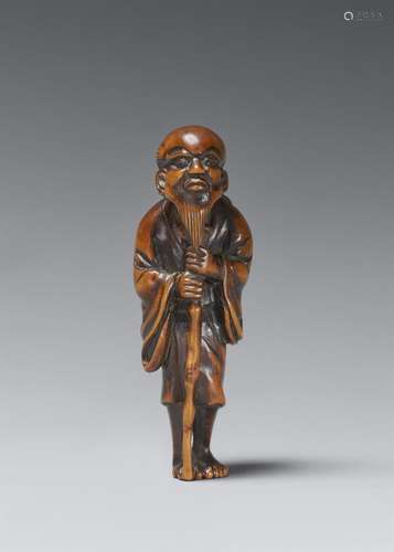 A boxwood netsuke of Tekkai Sennin. Around 1800