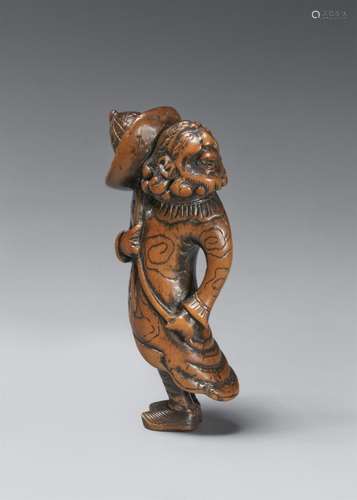 A boxwood netsuke of a standing Dutchman. Early 19th century