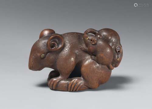 A wood okimono netsuke of rats. Second half 19th century