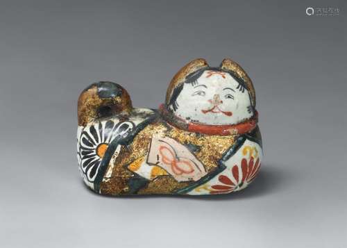 A rare ceramic netsuke of an inubako in the style of Ritsuô....