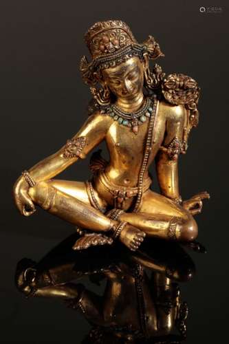 A SINO-TIBETAN GILT BRONZE FIGURE OF INDRA