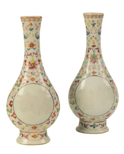 A PAIR OF CHINESE FAMILLE ROSE BOTTLE VASES