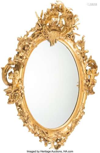 A Rococo Revival Oval Giltwood Mirror, 19th century  53-1/2 ...