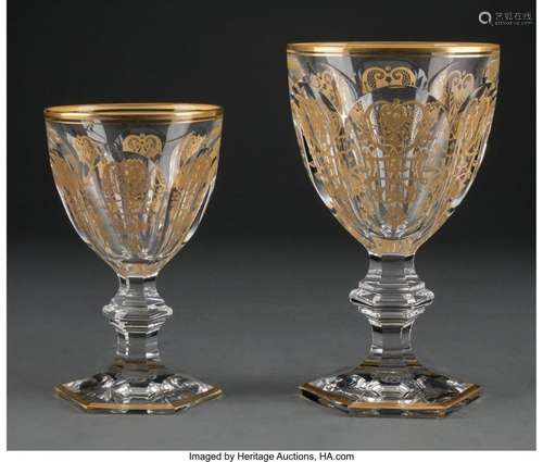 A Twenty-Eight-Piece Baccarat Empire Pattern Partial-Gilt Gl...