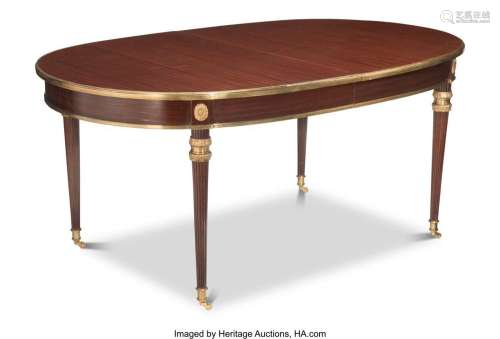 An Empire-Style Gilt Bronze Mounted Mahogany Dining Table, 2...