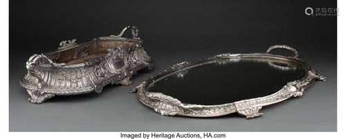 A Baroque-Style Silvered Metal Centerpiece on Mirrored Plate...