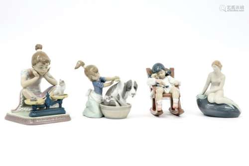 four figures in Lladro marked porcelain