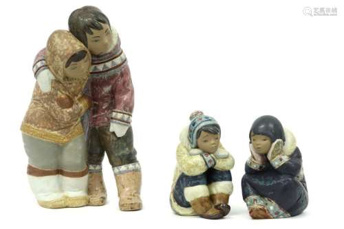 three Inuit child figures in Lladro marked ceramic