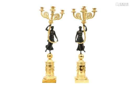 pair of Empire style candelabra in partially gilded bronze e...