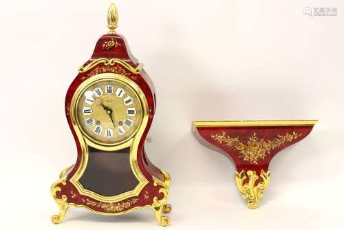 clock in Louis XV style with case in laxquered wood