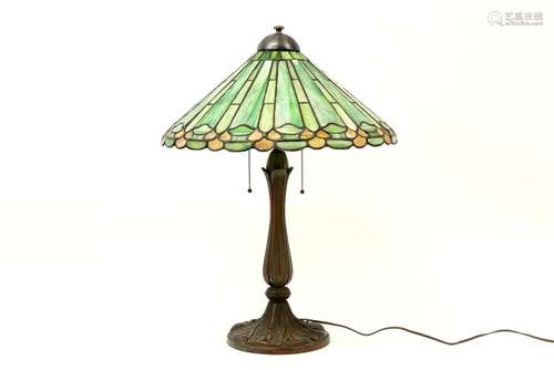 Tiffany style lamp with bronze base and glass-in-lead shade