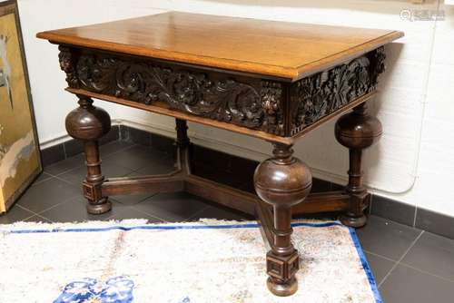 antique table in oak with a sculpted frieze and with a base ...