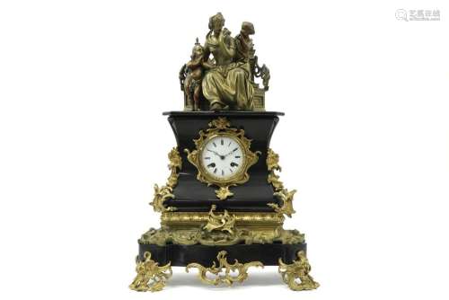 19th Cent. clock in black marble and gilded bronze…