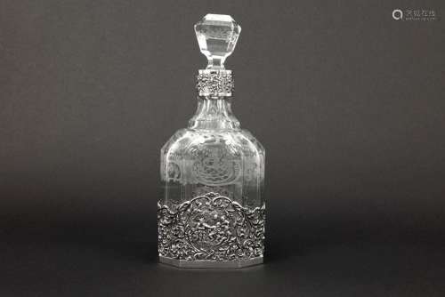 Dutch decanter in clear crystal and marked silver…