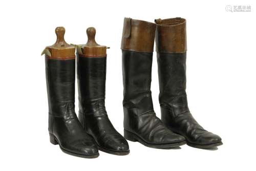 two pairs of leather boots, one pair with wooden l…