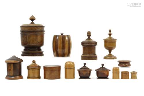collection of old and antique lidded boxes in wood…