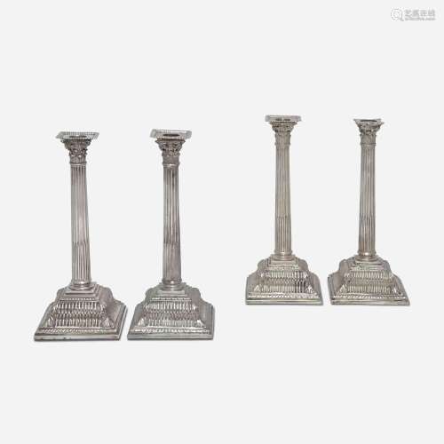 A set of four English sterling silver candlesticks Goldsmith...