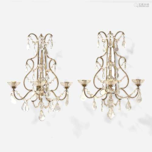 A pair of George III style glass and mirrored metalwork scon...