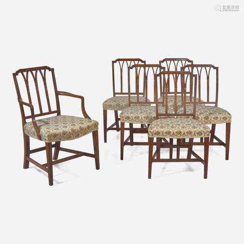 A set of six Federal style carved mahogany dining chairs lat...