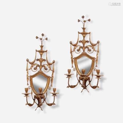 A pair of Neoclassical giltwood and mirrored candle sconces ...