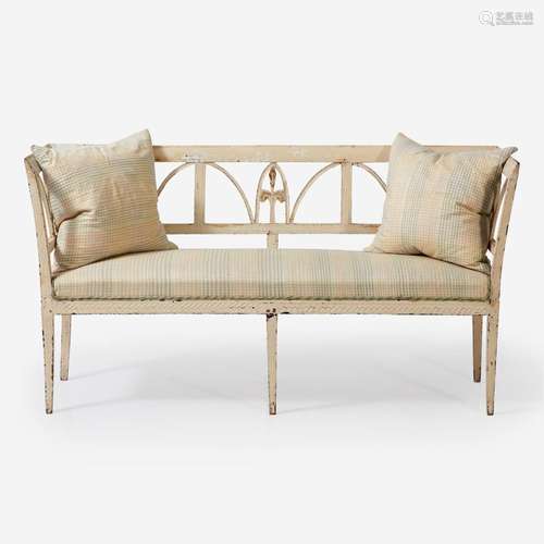 A Northern European cream-painted carved wood settee late 19...