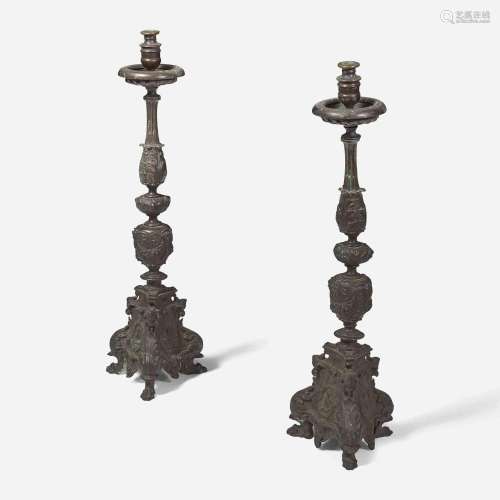 A pair of Italian Baroque patinated bronze candlesticks 19th...