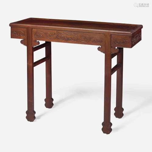 A Chinese carved hardwood side table