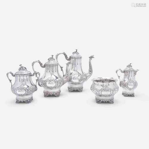 A five-piece coin silver repoussé tea and coffee service Woo...
