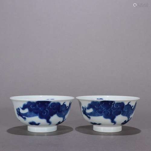 Pair of blue and white dragon tea bowls over the wall