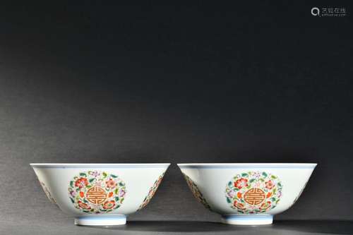 A pair of pastel bowls with longevity characters