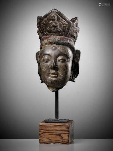 A MAGNIFICENT LIMESTONE HEAD OF GUANYIN, YUAN TO MING DYNAST...