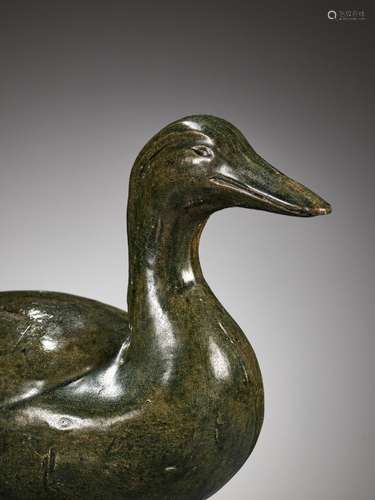 A GREEN GLAZED POTTERY FIGURE OF A DUCK, HAN DYNASTY