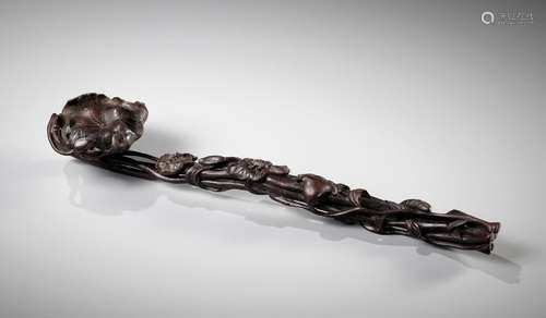 A ZITAN WOOD ‘LOTUS’ RUYI SCEPTER, PROBABLY IMPERIAL