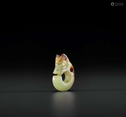 A YELLOW AND RUSSET MINIATURE ‘PIG DRAGON’ PENDANT, ZHULONG,...