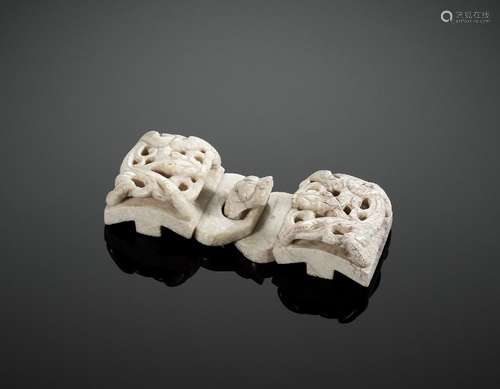 A CHICKEN BONE JADE ‘CHILONG’ BELT HOOK AND BUCKLE, MING DYN...