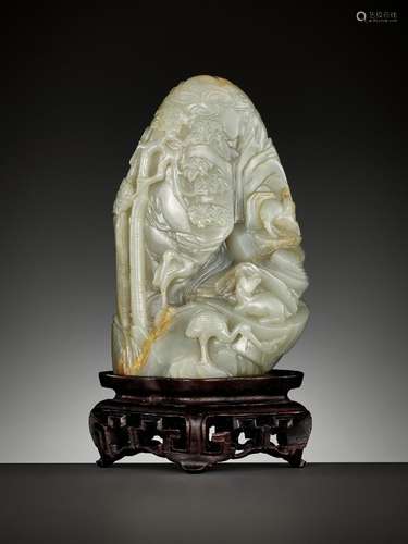 A CELADON AND RUSSET JADE ‘DEER AND CRANE’ BOULDER, 18TH CEN...