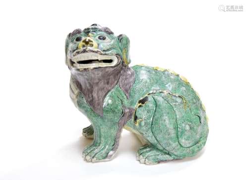 A Kangxi Biscuit Lion Statue
