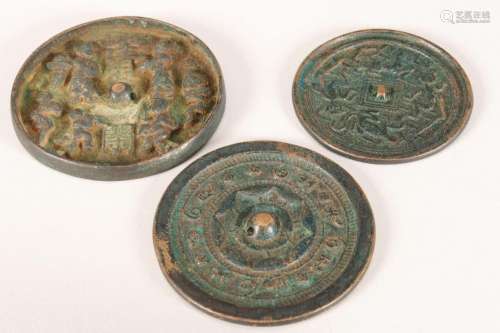 Three Chinese Bronze Mirrors,
