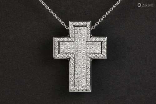 beautiful cross-shaped pendant in white gold (18 carat) with...