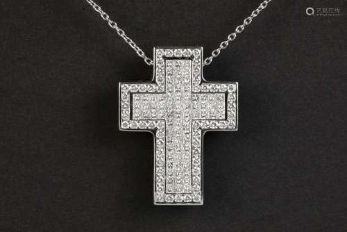 beautiful cross-shaped pendant in white gold (18 carat) with...