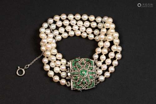 classy vintage bracelet with four rowes of white pearls, whi...