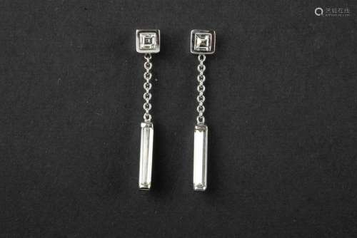 pair of earrings with a hand made design in white gold (18 c...
