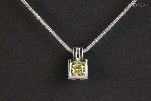 a 0,60 carat natural fancy yellow high quality rectangular m...