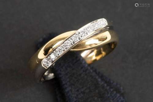ring in yellow and white gold (18 carat) with ca 0,10 carat ...