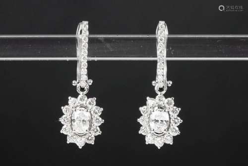 pair of elegant earrings in white gold (18 carat) each with ...
