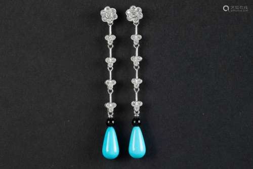 pair of quite long earrings in white gold (18 carat) with ca...