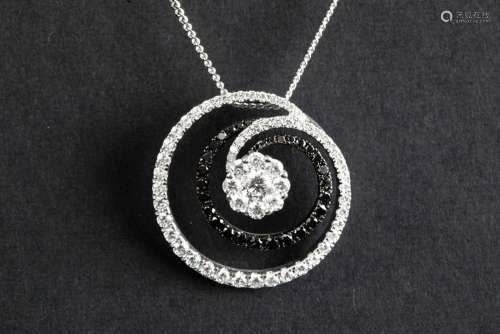 pendant in white gold (18 carat) with ca 1,40 carat of black...