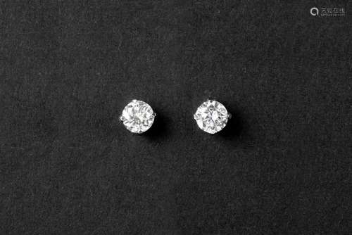 pair of earrings in white gold (18 carat) each with one bril...