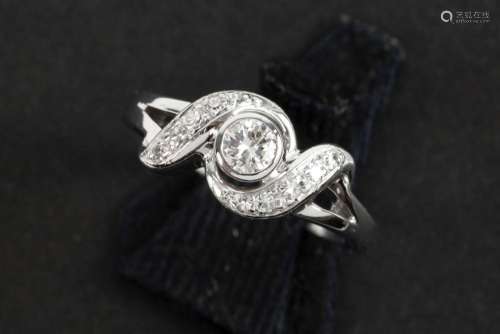 ring in white gold (18 carat) with at least 0,25 carat of ve...
