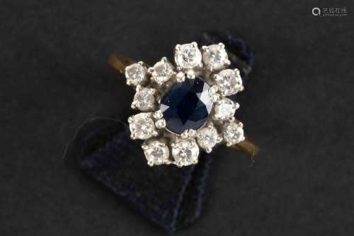 ring in white gold (18 carat) with a ca 1 carat sapphire sur...
